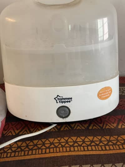 Tomee tippee bottle steriliser