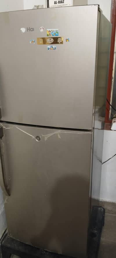 Haier fridge medium size good condition location Gujrat