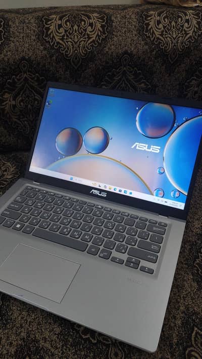 ASUS VivoBook X415MA in good working condition.