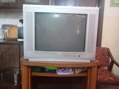 TCL Television in fully functional condition with trolley