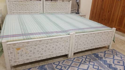 2 single beds with mattress
