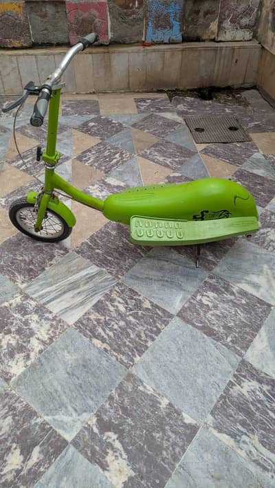 Imported Kids Scooter – Unique Green Color – Used but Good Condition