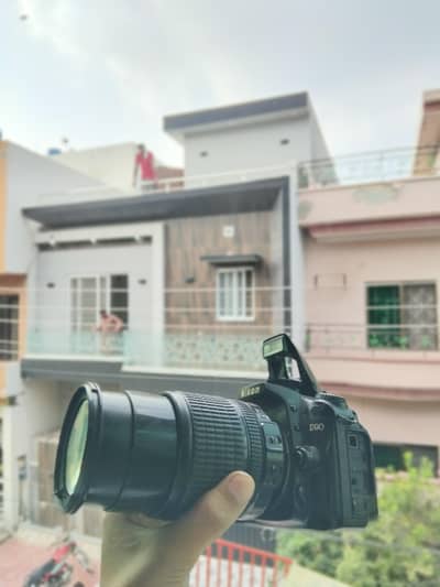nikon d90 with 18/105 lense photo plus video and all asseries