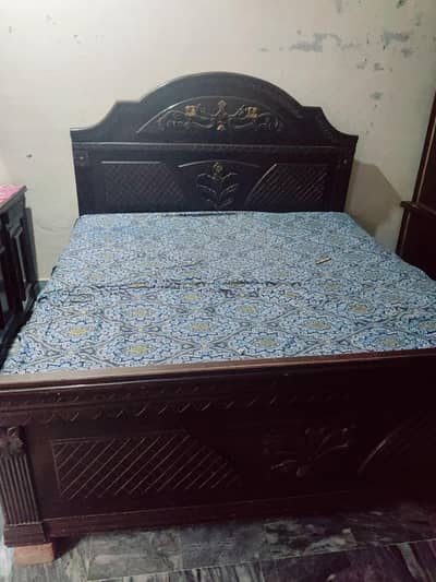 Bed and clothes almari and mirrors almari with to bed dror