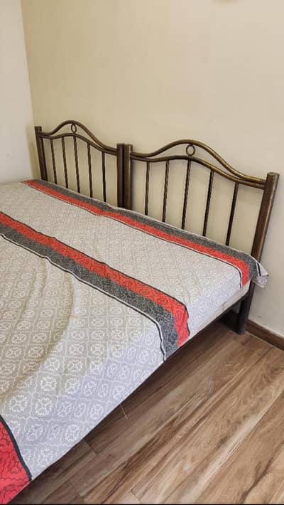 Two single beds for sale