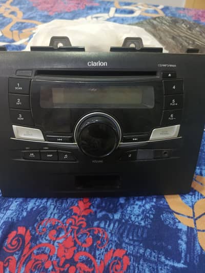 Original Suzuki Wagon R VXL ka genuine Clarion player hai. CD, MP3, WM