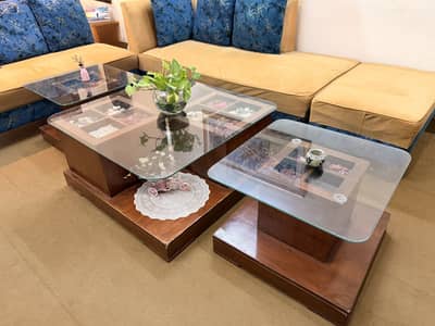 wooden with glass top center table with two side tables