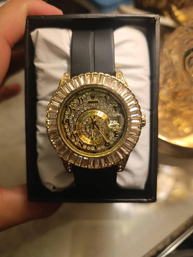 Rol. . . Watch 0