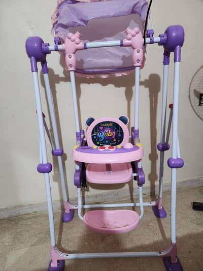 kids swing in pink colour