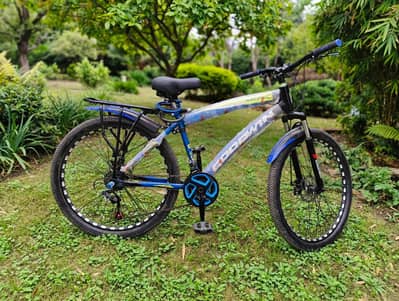 bicycle size 26 inch  blue color with back carear 10/10 condition