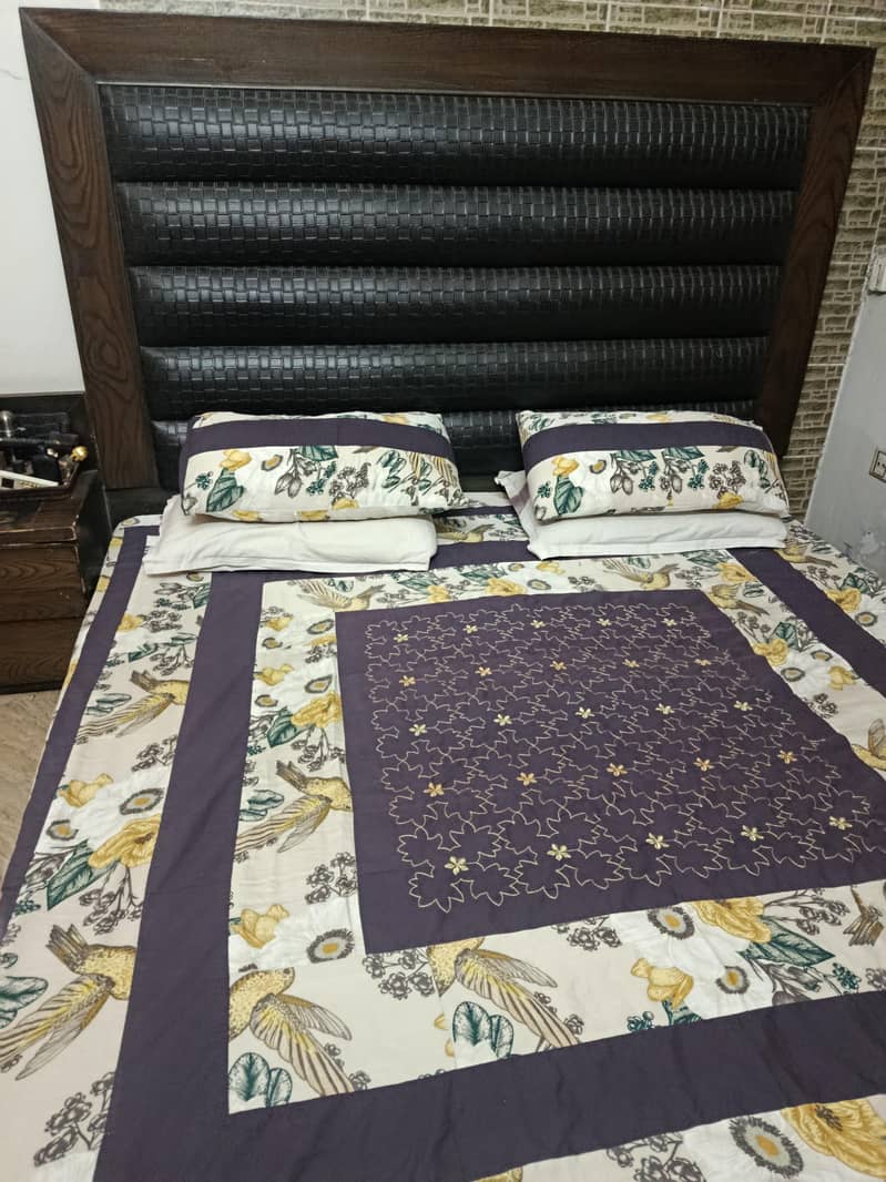 king size bed with side table 0