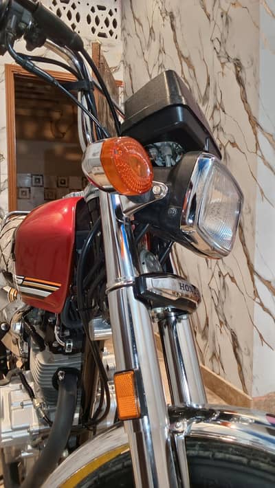I am selling Honda cg 125 self chrome edition neet and clean bike