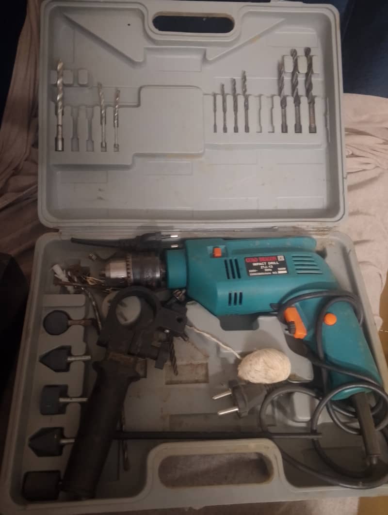 Drill machine with bits and box 1