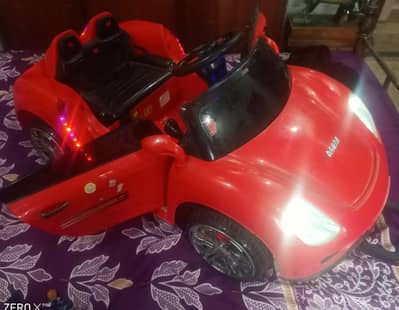 IMPORTED KIDS CAR with REMOTECONTROL & OPERABLE DOORS / All ok