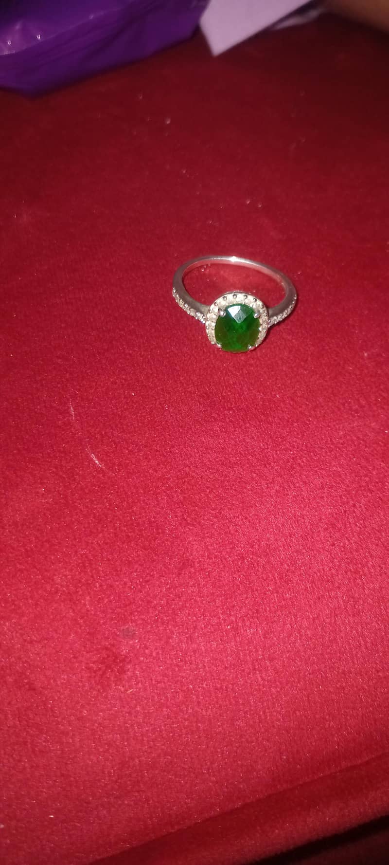 silver ring with stone 0