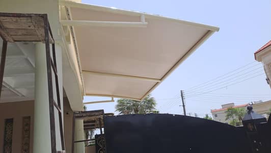 tensile fabric car parking shade