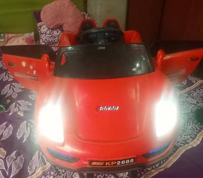 IMPORTED KIDS CAR with REMOTECONTROL & OPERABLE DOORS / All ok