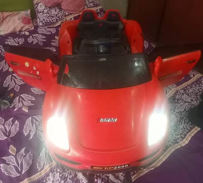 IMPORTED KIDS CAR with REMOTECONTROL & OPERABLE DOORS / All ok