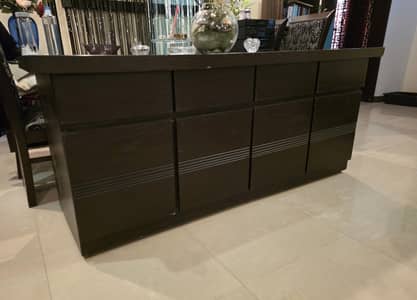 Wooden chester table with 4 drawers