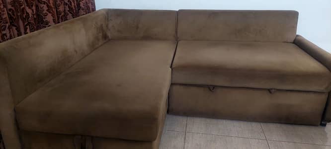 sofa cum bed with two large cushions