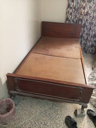 two single wooden bed