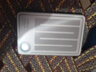 infinix wireless power bank almost new