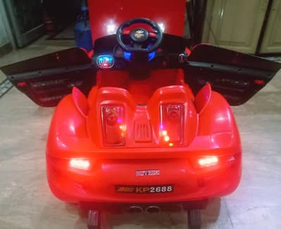 IMPORTED KIDS CAR with REMOTECONTROL & OPERABLE DOORS / All ok