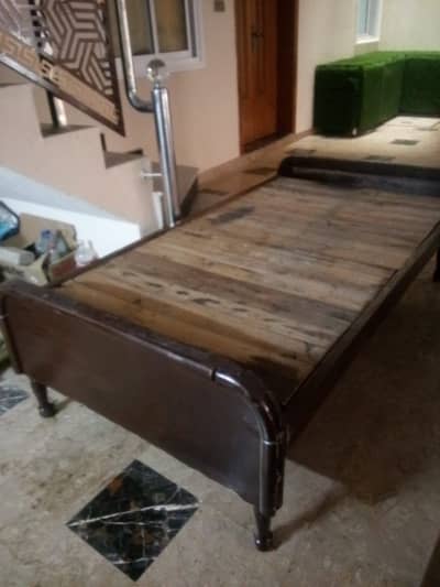 Wooden single bed