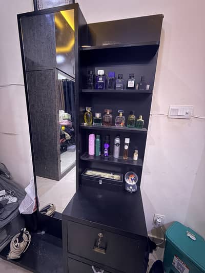 modern black wooden dressing table with an integrated tall mirror and