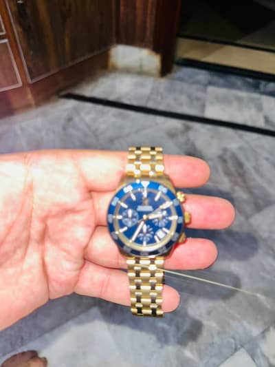 original gold water plated tommy hilfigure watch