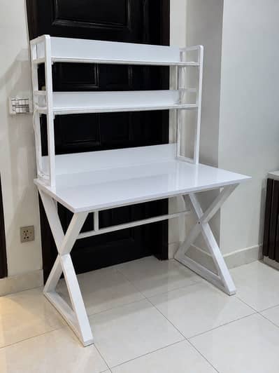 White gaming table with shelves
