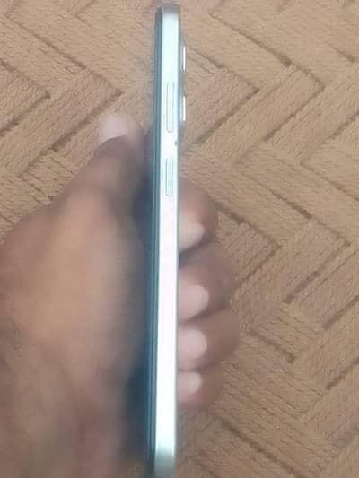Infinix Hot 50i 6.128