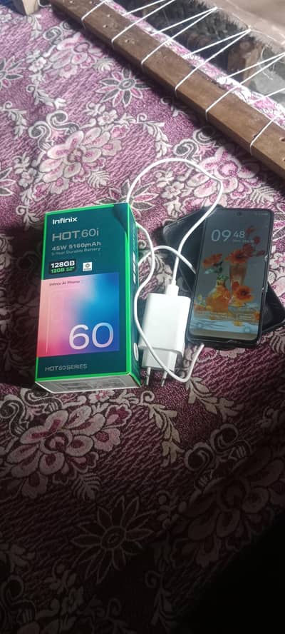 Infinix hot 60i warranty+box+charger