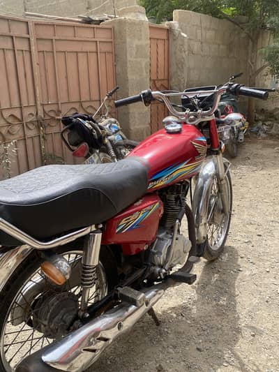honda 125  karachi number 2018 /2019 all clear koi kam nai
