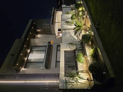 1 kanal 3 Story's MDR Brand New House Available For Sale in Faisal Town phase 1 of Block B Islamabad Pakistan