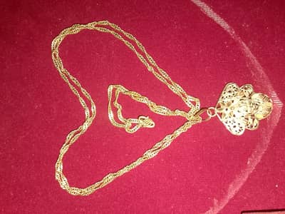 chain locket pivar gold 430;000 per tola k hisab sai