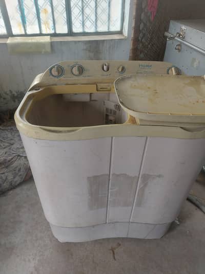 heir washing machine with dryer. . . .