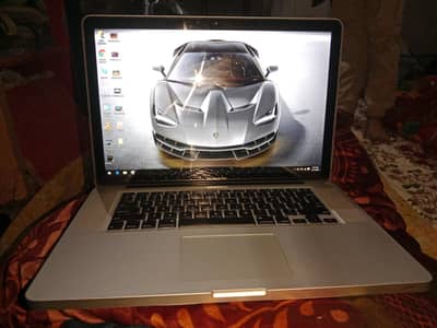 MacBook Pro 15 inch display 8GB RAM 500 GB hard window and OS