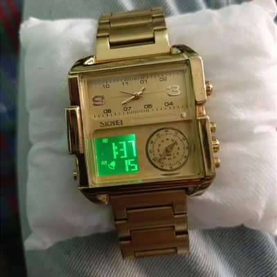 skmei 3 in one time watch like a gold Breck