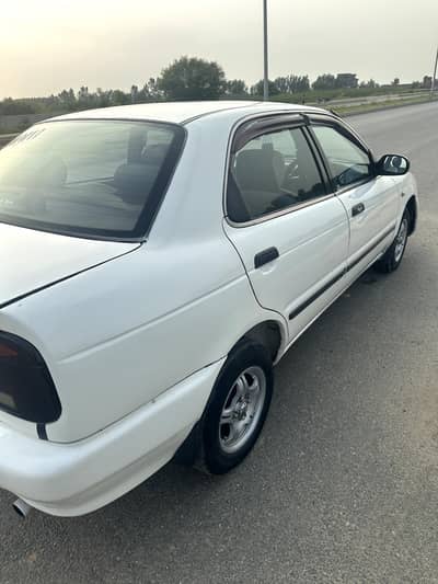 Suzuki Baleno 2004 15 average