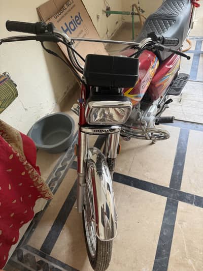 Honda 125 one hand use mery name