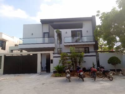 **Luxury & ; Brand New BUNGALOW For Sale** **Prime Location:* *DHA PHASE 6 KHAYABAN E RAHAT* **Property Highlights:** Spacious 6 Bedrooms With Attached Bathrooms LIVING LOUNGE Basement* Swimming Pool Luxury' Living Lounge
