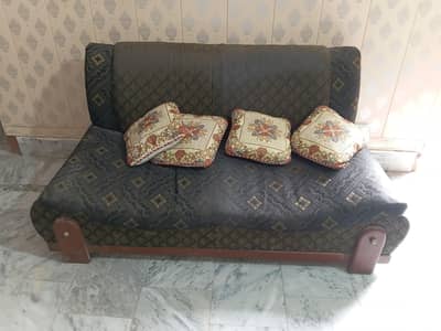 black sofa in decent condition urgent sale