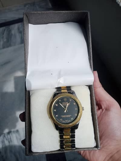 GOLDEN AND BLACK WATCH WITH BOX