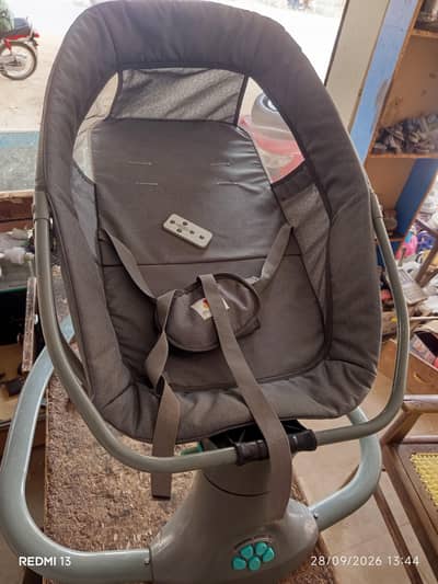 electric baby swing and rocker  جھولا