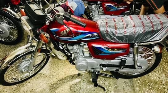 Honda 125 Model 2024 lush condition with security alarm