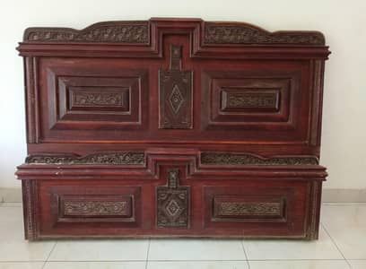 wooden bed with mattres