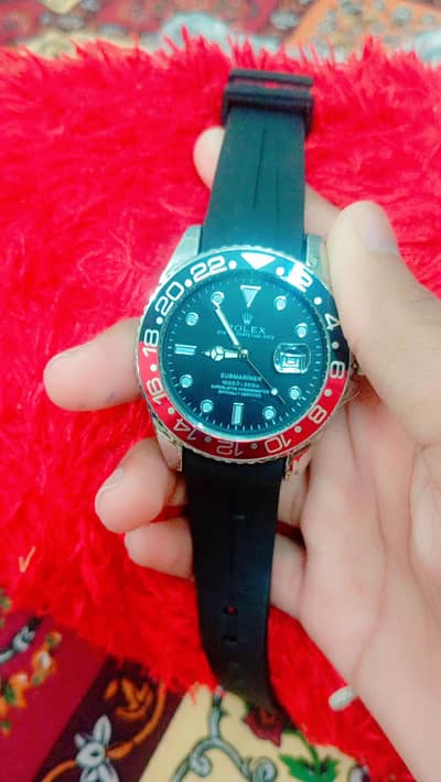 ROLEX Watch black and red dail colour