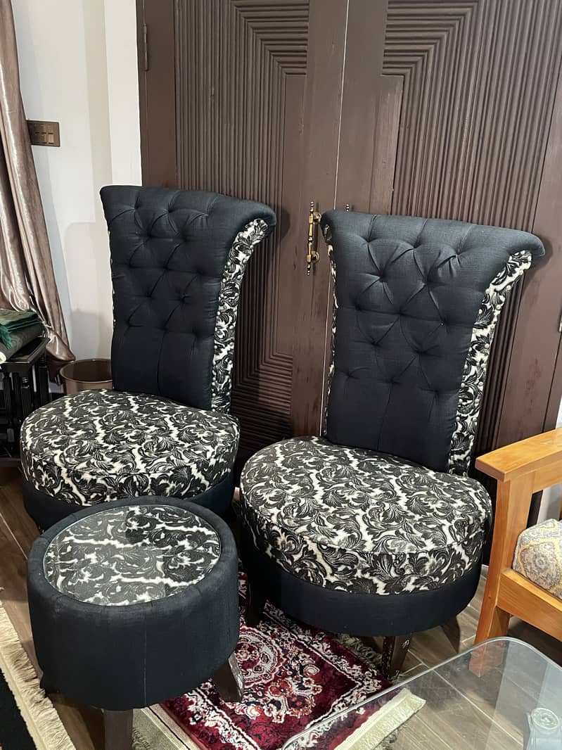 A pair of black high-back tufted accent/Sofa chairs with table 2