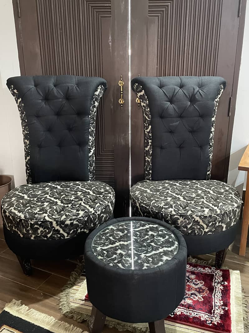 A pair of black high-back tufted accent/Sofa chairs with table 3